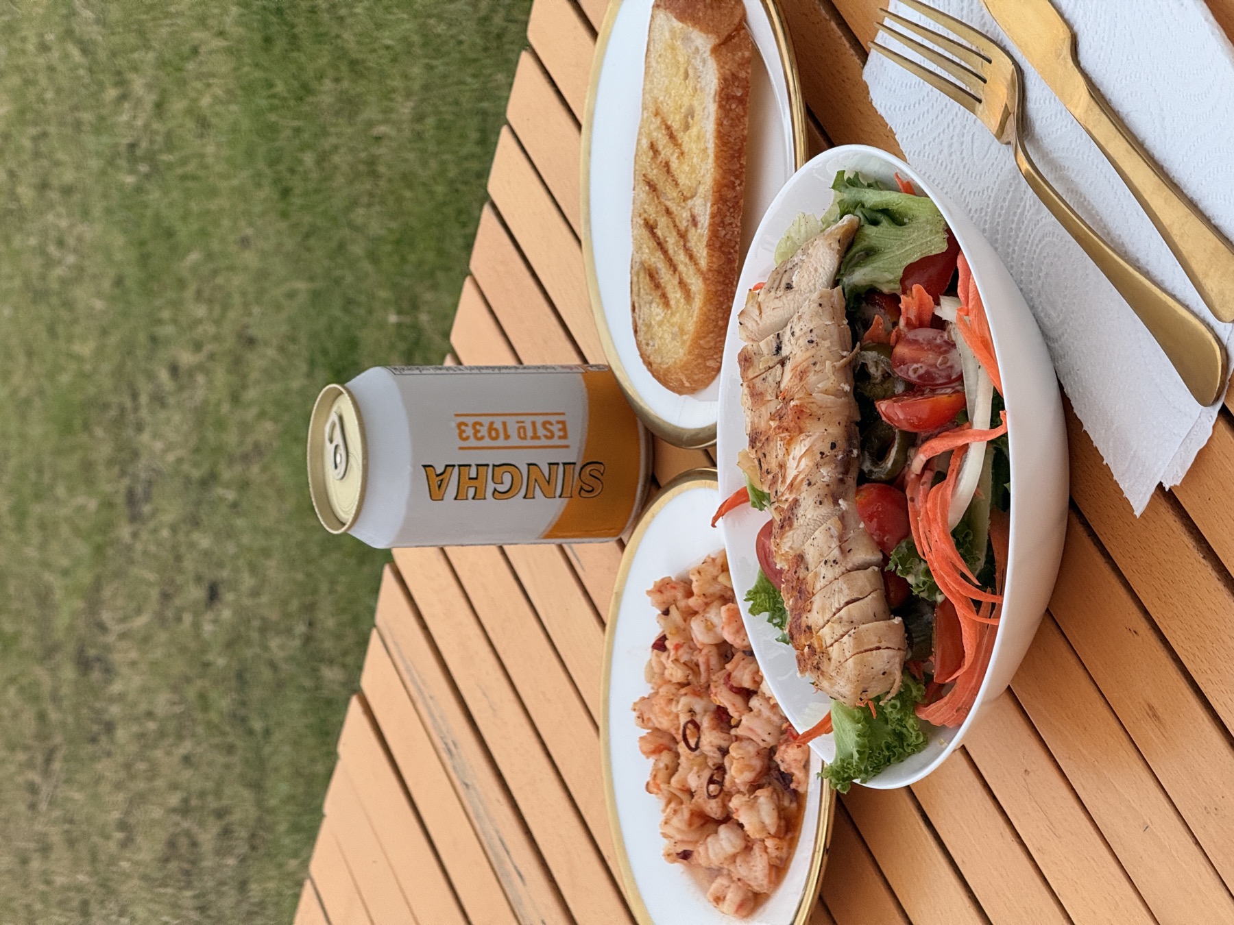 Grilled chicken salad with Singha beer